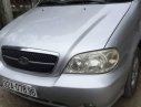 Kia Carnival 2005 - Bán Kia Carnival đời 2005, màu bạc chính chủ