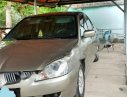 Mitsubishi Lancer GLX 1.6AT 2005 - Bán xe cũ Mitsubishi Lancer GLX 1.6AT đời 2005, màu vàng số tự động, 290 triệu