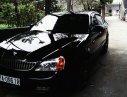 Daewoo Magnus 2004 - Cần bán xe Daewoo Magnus 2004, màu đen