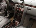 Mercedes-Benz E200 2002 - Cần bán Mercedes E200 đời 2002, màu đen, 245tr