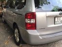 Kia Carnival 2011 - Bán Kia Carnival đời 2011, màu bạc  