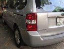 Kia Carnival 2011 - Bán Kia Carnival đời 2011, màu bạc  