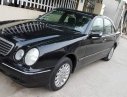 Mercedes-Benz E240 2002 - Cần bán Mercedes-Benz E240 đăng ký 2002, màu đen ít sử dụng, 207tr