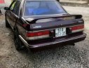 Mazda 323 1988 - Cần bán gấp Mazda 323 sản xuất 1988, màu nâu