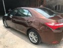 Toyota Corolla altis 2014 - Cần bán gấp Toyota Corolla Altis đời 2014, màu nâu đã đi 48000 km, 650 triệu