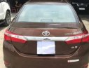 Toyota Corolla altis 2014 - Cần bán gấp Toyota Corolla Altis đời 2014, màu nâu đã đi 48000 km, 650 triệu