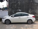 Kia K3 2014 - Chính chủ bán ô tô Kia K3 2014, màu trắng