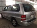 Kia Carnival 2.5 2005 - Cần bán Kia Carnival 2.5 sản xuất 2005, màu bạc