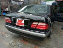 Mercedes-Benz E240   2004 - Cần bán xe Mercedes-BenzE240 2004, màu đen