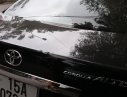 Toyota Corolla altis MT 2011 - Bán Toyota Corolla Altis MT sản xuất 2011, màu đen số sàn giá cạnh tranh