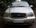 Kia Carnival GS 2006 - Cần bán gấp Kia Carnival GS đời 2006, màu bạc số sàn