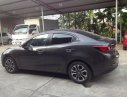 Mazda 2 2015 - Chính chủ bán Mazda 2 đời 2015, màu nâu 