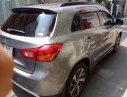 Mitsubishi Outlander Sport 2.0 GLS 2014 - Bán xe cũ Mitsubishi Outlander Sport 2.0 GLS đời 2014, màu xám, giá 859 triệu