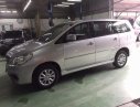 Toyota Innova E 2014 - Cần bán Toyota Innova E đời 2014, màu bạc số sàn, giá 670tr