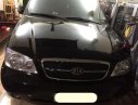 Kia Carnival GS 2006 - Gia đình cần bán xe Kia Carnival GS 2006 màu đen