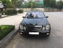 Mercedes-Benz E200 2004 - Cần bán lại xe Mercedes E200 đời 2004, màu đen, 380 triệu