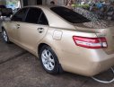 Toyota Camry LE 2010 - Cần bán xe Toyota Camry LE 2010, màu vàng, nhập khẩu