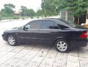 Mazda 626 MT 2004 - Cần bán gấp Mazda 626 MT đời 2004, màu đen chính chủ