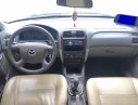 Mazda 626 MT 2004 - Cần bán gấp Mazda 626 MT đời 2004, màu đen chính chủ