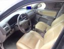 Mazda 626 MT 2004 - Cần bán gấp Mazda 626 MT đời 2004, màu đen chính chủ