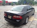 Mazda 626 MT 2004 - Cần bán gấp Mazda 626 MT đời 2004, màu đen chính chủ