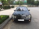 Mercedes-Benz E200 2004 - Cần bán Mercedes đời 2004, màu đen giá cạnh tranh