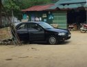 Mazda 323   1998 - Cần bán xe cũ Mazda 323 đời 1998, màu đen