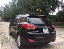 Hyundai Tucson LX20 Limited 2010 - Cần bán Hyundai Tucson LX20 Limited đời 2010, màu đen, nhập khẩu nguyên chiếc, giá chỉ 618 triệu