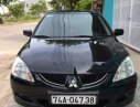 Mitsubishi Lancer 2004 - Cần bán xe Mitsubishi Lancer sản xuất 2004, màu đen, nhập khẩu nguyên chiếc, 260tr