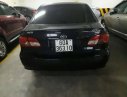 Toyota Corolla   1.8  2005 - Bán xe cũ Toyota Corolla 1.8 đời 2005, màu đen còn mới, giá 390tr