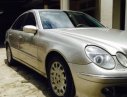 Mercedes-Benz E240 2002 - Cần bán lại xe Mercedes E240 đời 2002, màu vàng còn mới, 310 triệu