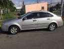 Daewoo Lacetti 2009 - Gia đình bán xe Daewoo Lacetti đời 2009, màu bạc