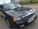 Daewoo Magnus 2.5AT 2004 - Cần bán Daewoo Magnus 2.5AT đời 2004, màu đen, giá chỉ 152 triệu