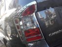 Kia Carens  EX 2011 - Cần bán lại xe Kia Carens EX đời 2011, màu đen còn mới, giá chỉ 335 triệu