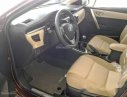 Toyota Corolla altis 2017 - Bán Toyota Corolla Altis sản xuất 2017, màu nâu, 669tr