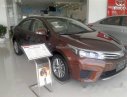 Toyota Corolla altis 2017 - Bán Toyota Corolla Altis sản xuất 2017, màu nâu, 669tr