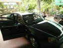 Daewoo Magnus 2004 - Bán ô tô Daewoo Magnus đời 2004, màu đen