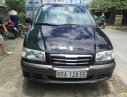 Hyundai Trajet AT 2004 - Bán Hyundai Trajet sản xuất 2004, màu đen, xe nhập số tự động, giá 320tr