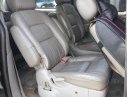 Kia Carnival 2007 - Cần bán Kia Carnival đăng ký 2007, màu đen còn mới, giá tốt 235tr