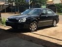 Daewoo Magnus  2.0 MT 2004 - Cần bán lại xe Daewoo Magnus 2.0 MT đời 2004