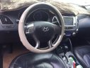 Hyundai Tucson LMX 2.0 VVT 2010 - Cần bán Hyundai Tucson LMX 2.0 VVT đời 2010, màu trắng, xe nhập, giá 650tr