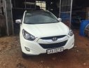 Hyundai Tucson LMX 2.0 VVT 2010 - Cần bán Hyundai Tucson LMX 2.0 VVT đời 2010, màu trắng, xe nhập, giá 650tr