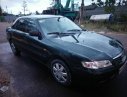 Mazda 626 2001 - Cần bán lại xe Mazda 626 đời 2001, màu xanh lam xe gia đình, giá 210tr