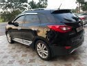 Hyundai Tucson 2.0 4WD 2012 - Bán Hyundai Tucson 2.0 4WD đời 2012, màu đen, nhập khẩu