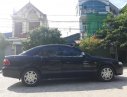 Mazda 626 SX 2001 - Bán Mazda 626 SX đời 2001, màu đen chính chủ