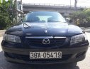 Mazda 626 SX 2001 - Bán Mazda 626 SX đời 2001, màu đen chính chủ