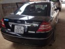 Ford Mondeo 2.5 AT 2004 - Xe Ford Mondeo 2.5 AT đời 2004, màu đen số tự động, giá chỉ 195 triệu