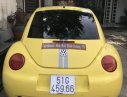 Volkswagen Beetle   2005 - Bán Volkswagen Beetle đời 2005, màu vàng, nhập khẩu số sàn