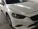 Mazda 6 2.0AT 2015 - Bán Mazda 6 2.0AT 2015, màu trắng xe gia đình, giá 750tr