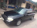 Kia Spectra MT 2005 - Cần bán gấp Kia Spectra MT đời 2005, màu đen